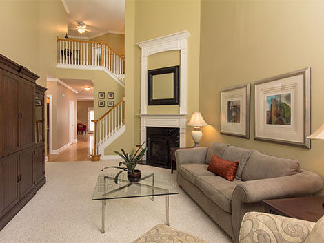 This is an example of typical AREPAV image. Flashes were deployed above the camera for the foreground, on the staircase, in the bathroom hallway, and back down the long hall in the kitchen area. All the lighting and coloring is even throughout the image.