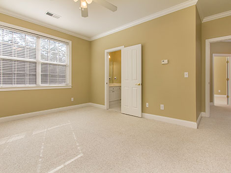 This is another typical AREPAV shot. Flashes were used in the bedroom, the bathroom, the hallway, and the second bedroom. Everything is consistent in lighting and color, and the windows are balanced so you can see the blinds and mullions.