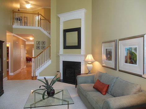 This looks similar to the all natural light shot. The big difference here is this camera can not shoot as wide as the DSLR with a wide lens. So, you can't see as much of the room. Also, we still have the problems with the lamps glowing and uneven color throughout the image .