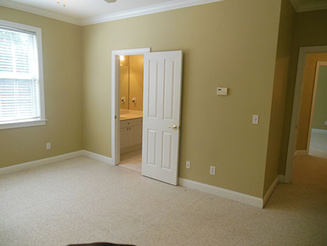 With this bedroom shot, we really see what not having a wide angle lens does to your pictures. You can only see a little part of the windows, and barely see through the door into the hallway. Plus, again, our windows are glowing, and wall colors are wrong.