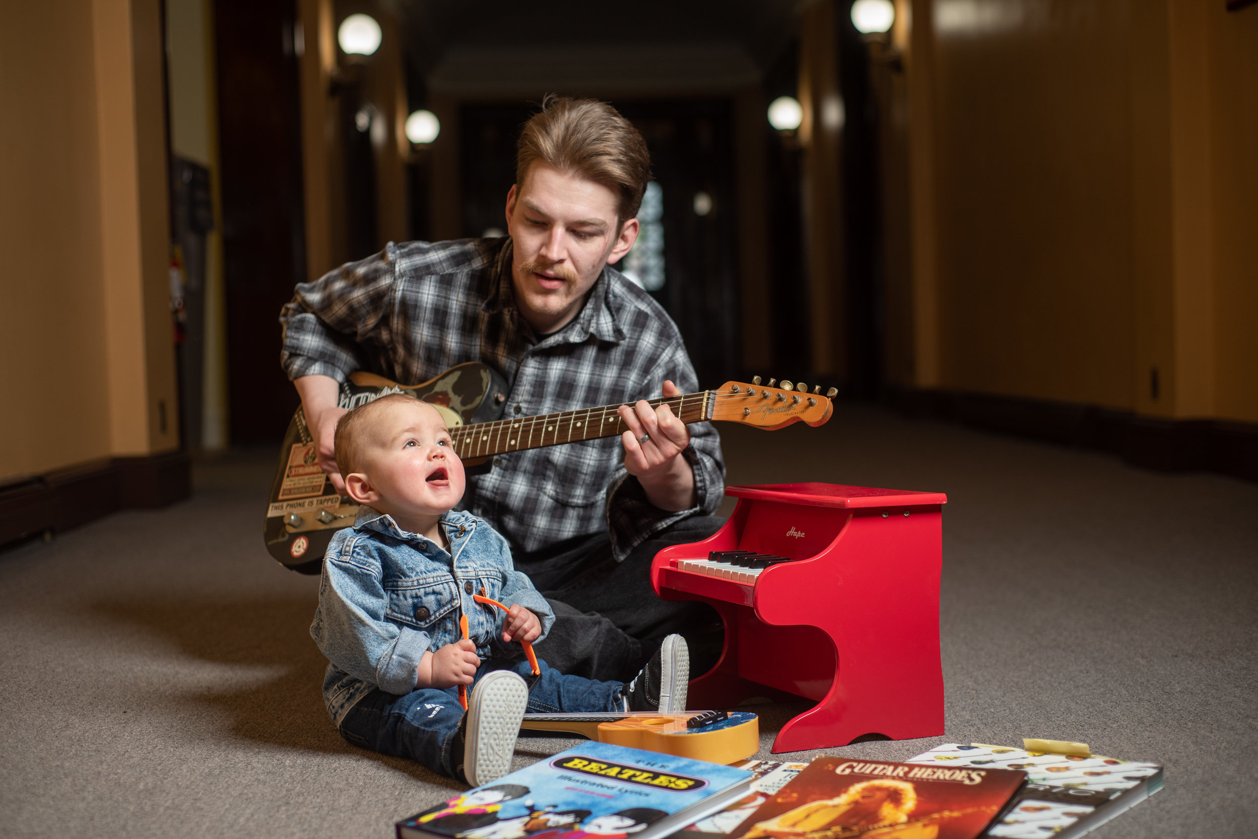 Henry singing with his dad