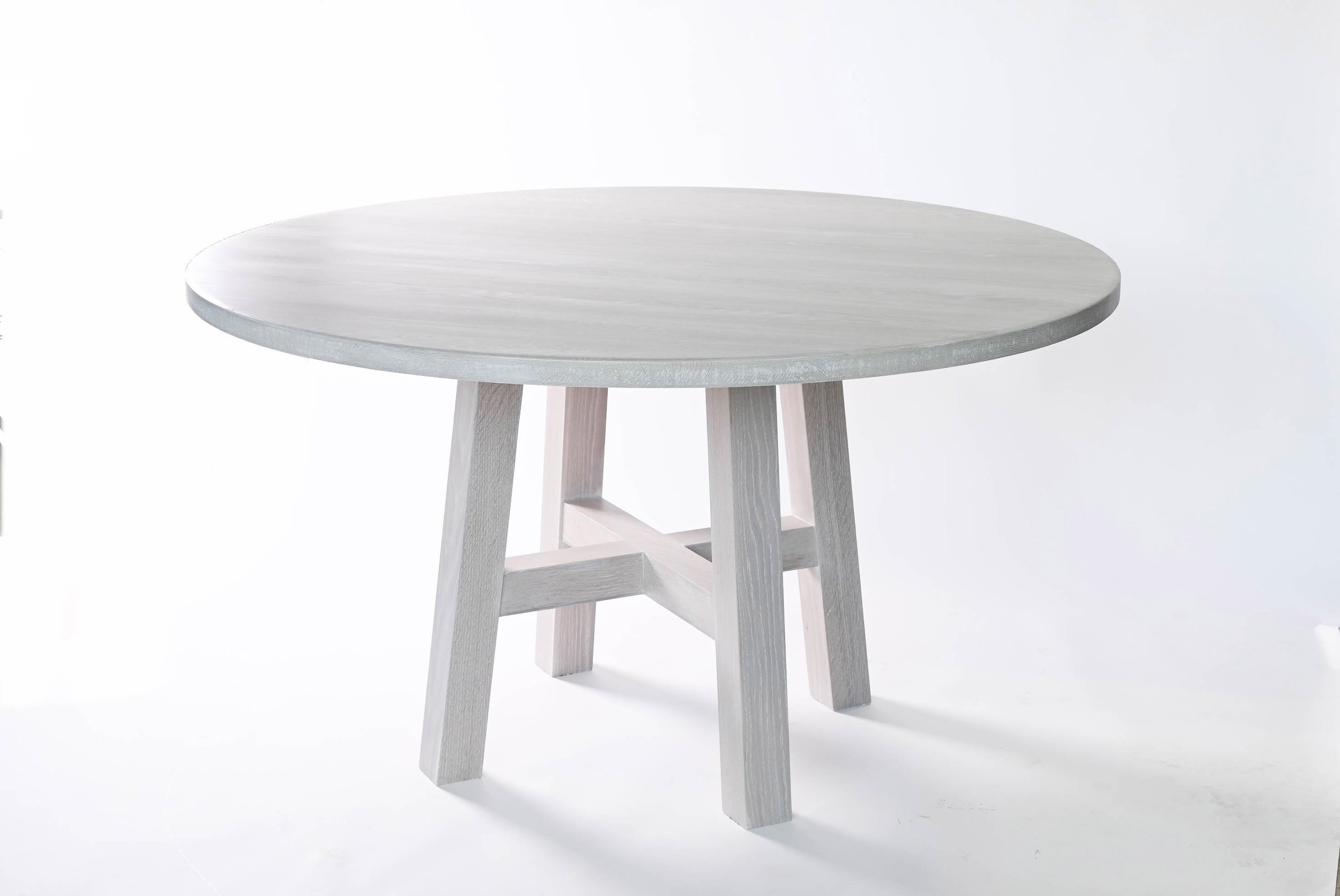 Mackenzie Round Top Dining Table, side view with base detail