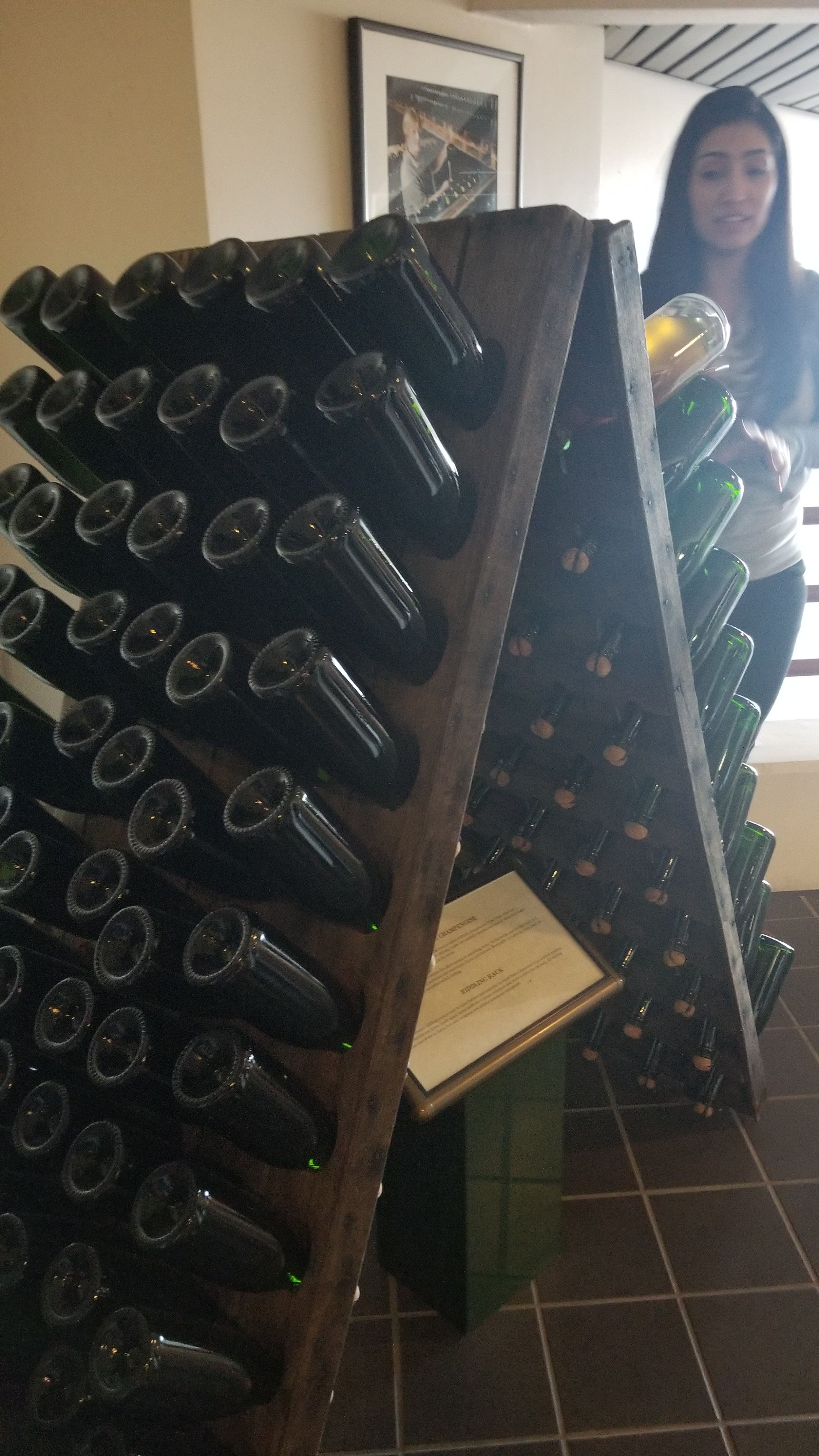 Riddling rack with Champagne bottles