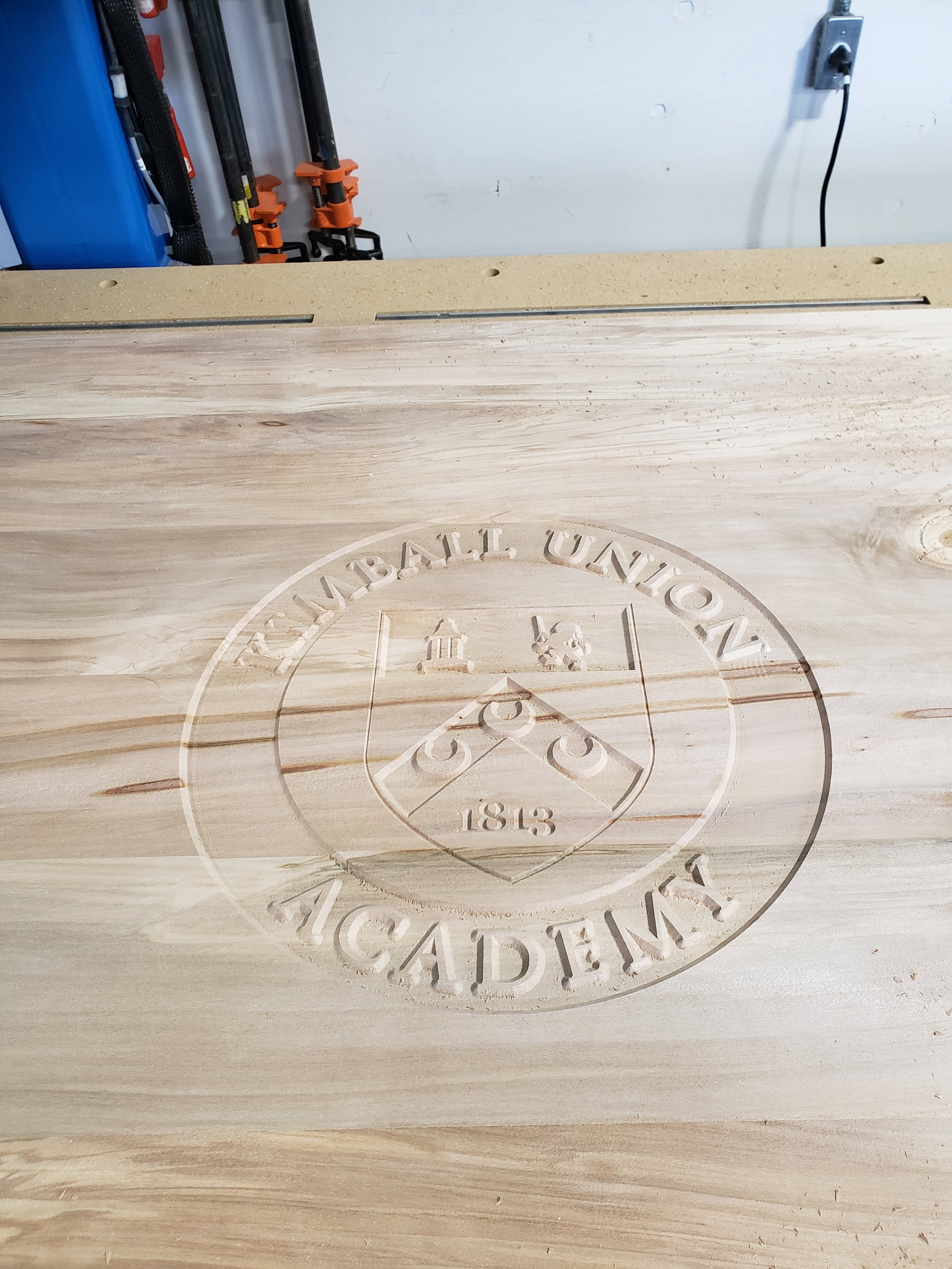 Carving of logo before expoxy
