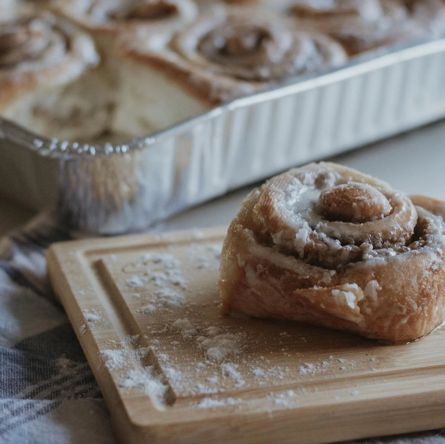 Product Photography Practice - Shawn’s Homemade Cinnamon Rolls - Shawn is a neighbor who, during COVID, has been providing home cooked meals for people afraid to leave their house. Most of her customers are elderly people who don’t know h