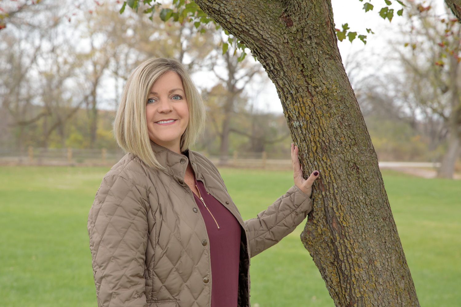 female_headshot_on_location_trimborn_farm_tree.jpg