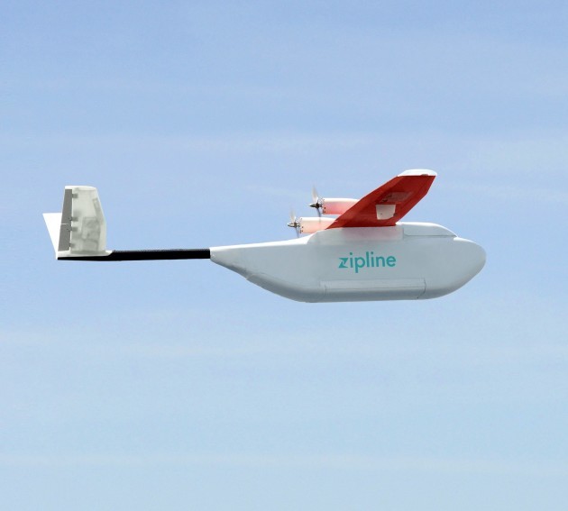 Zipline’s fixed-wing Zip drone airplane makes a flyover. (Credit: Zipline)