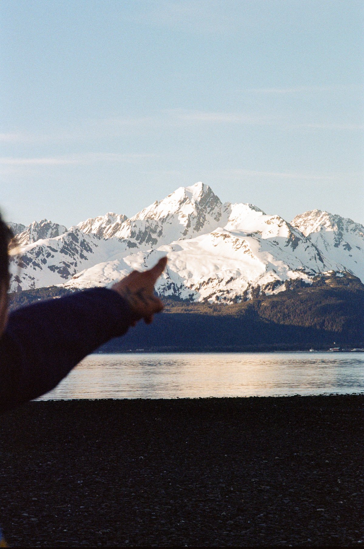 Pointing at the Mountain Top