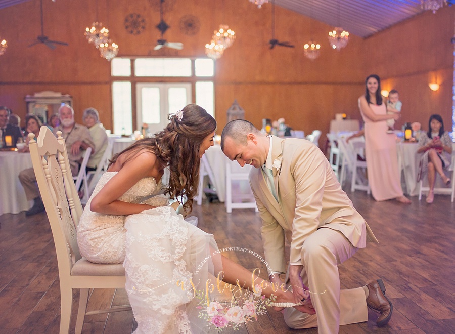 bride-groom-wedding-day-married-garter-toss-reception-fun-ashelynn-manor-naughty-woodlands-tx-houston-area-photography.jpg