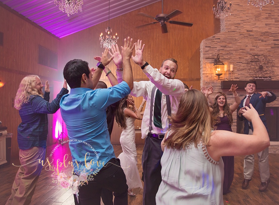 reception-dancing-wedding-fun-high-five-ashelynn-manor-exit-dance-photographer-documentary-rustic-wedding-family-together-77381-77002-77380-77382-77354-77384-77385-77375-77389-houston-area-fine-art.jpg