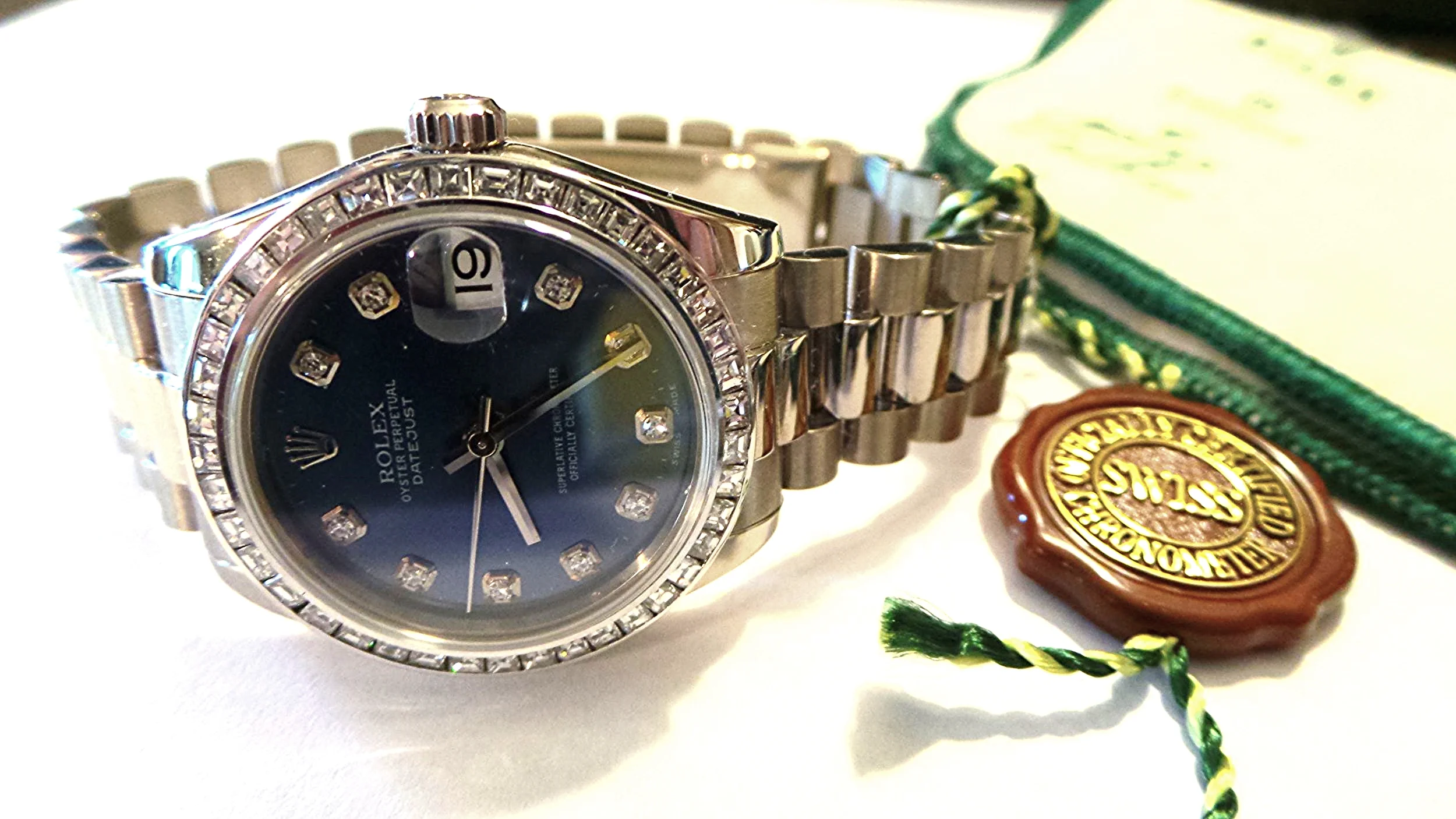 White gold Midsize Rolex with diamonds and a Blue dial
