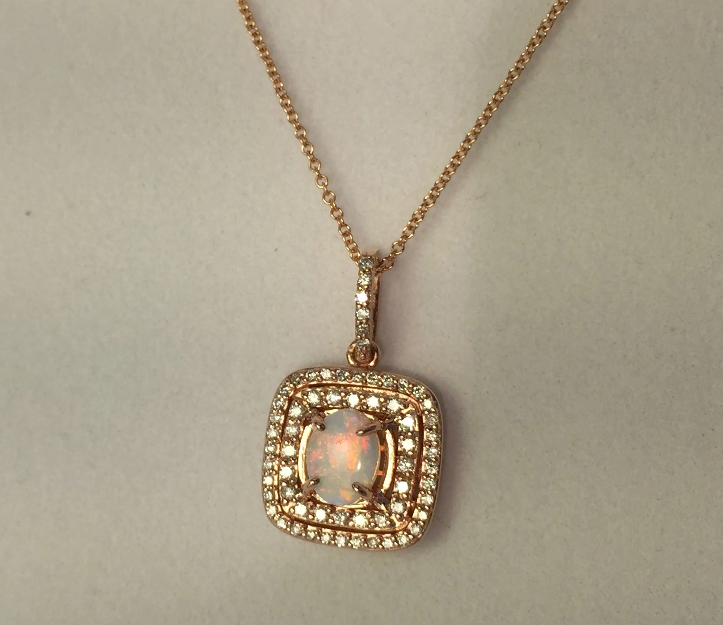 rose gold diamond and opal pendant