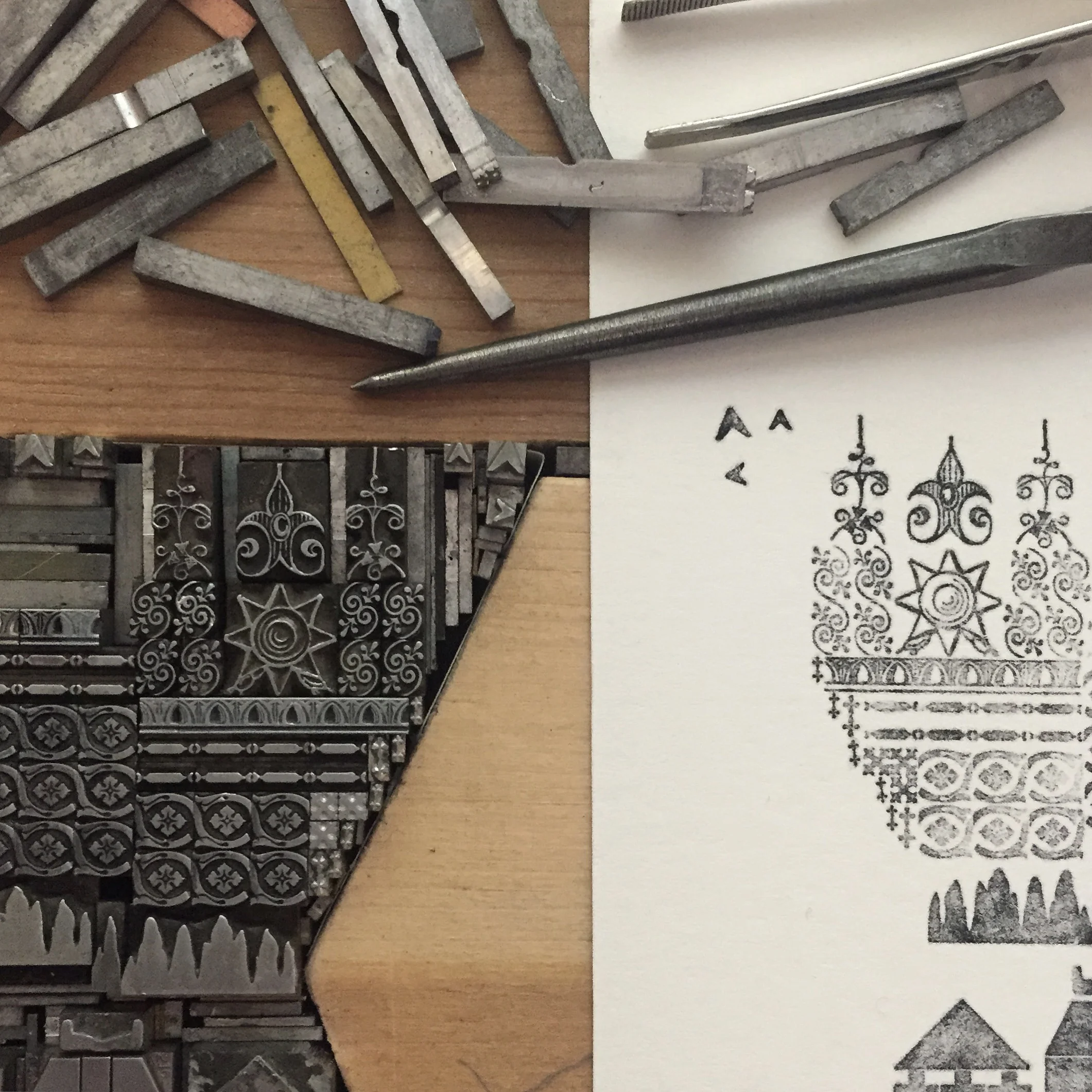 Preissig detail with tweezers, extra sorts and an etching needle for pushing down errant spaces.
