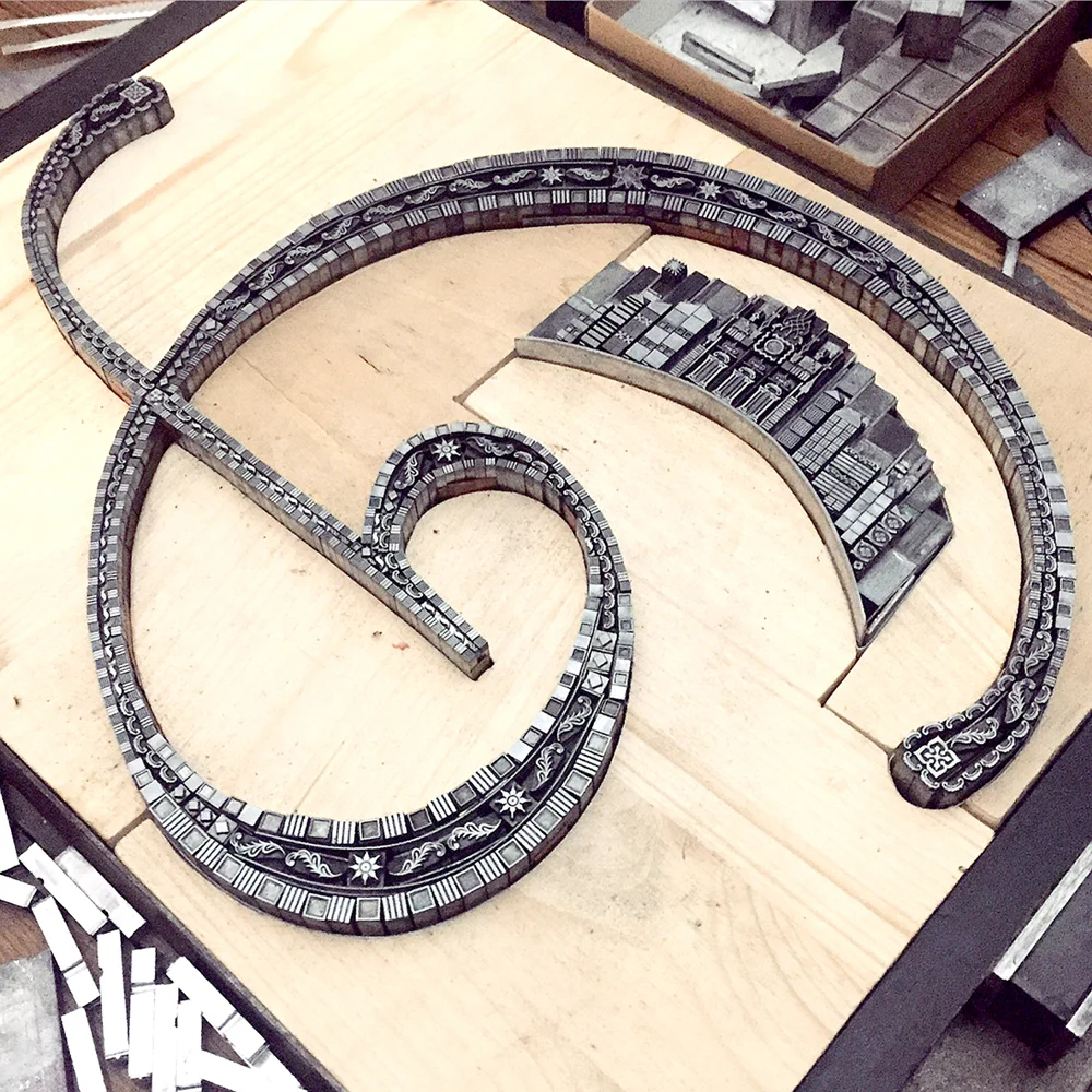 The final form, with many thin copper and brass spaces along the edges to help keep the curve true.