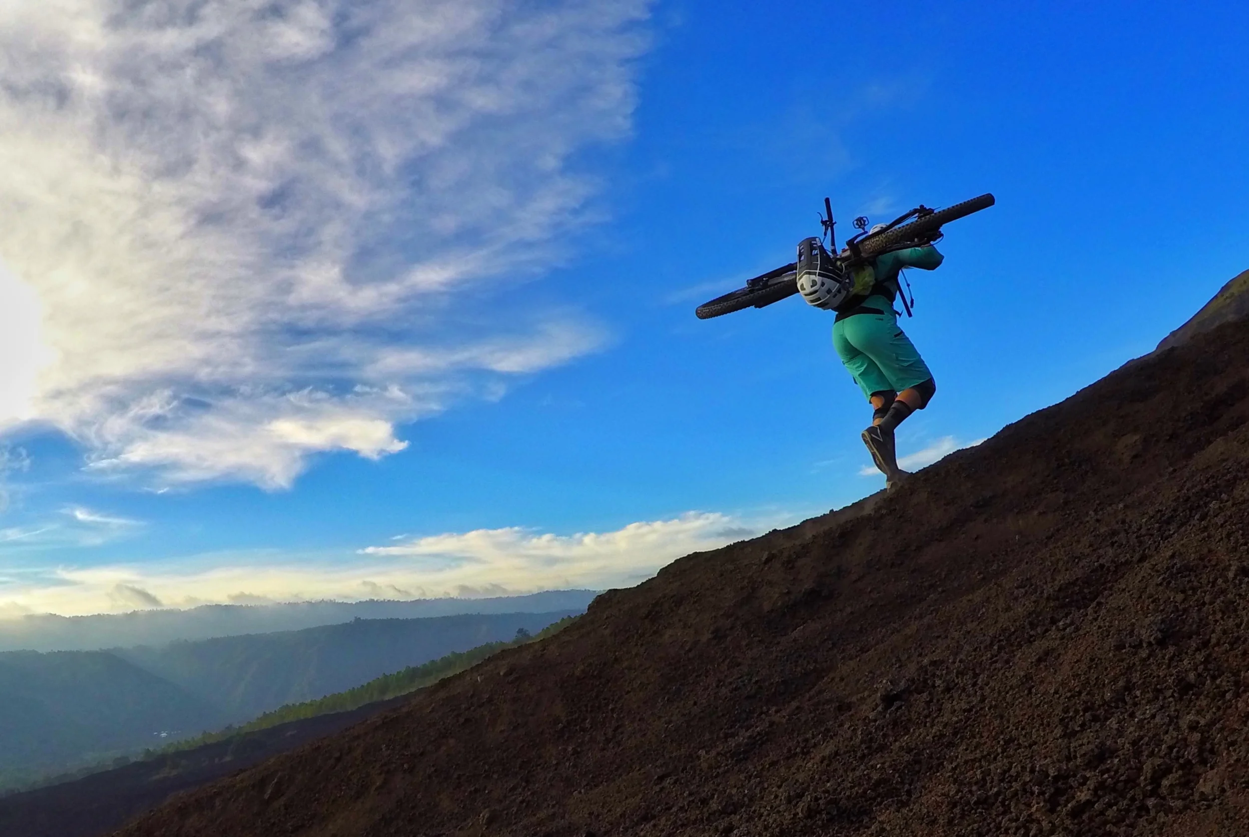 what comes up must come down. Earning turns on the black sands at sunset.