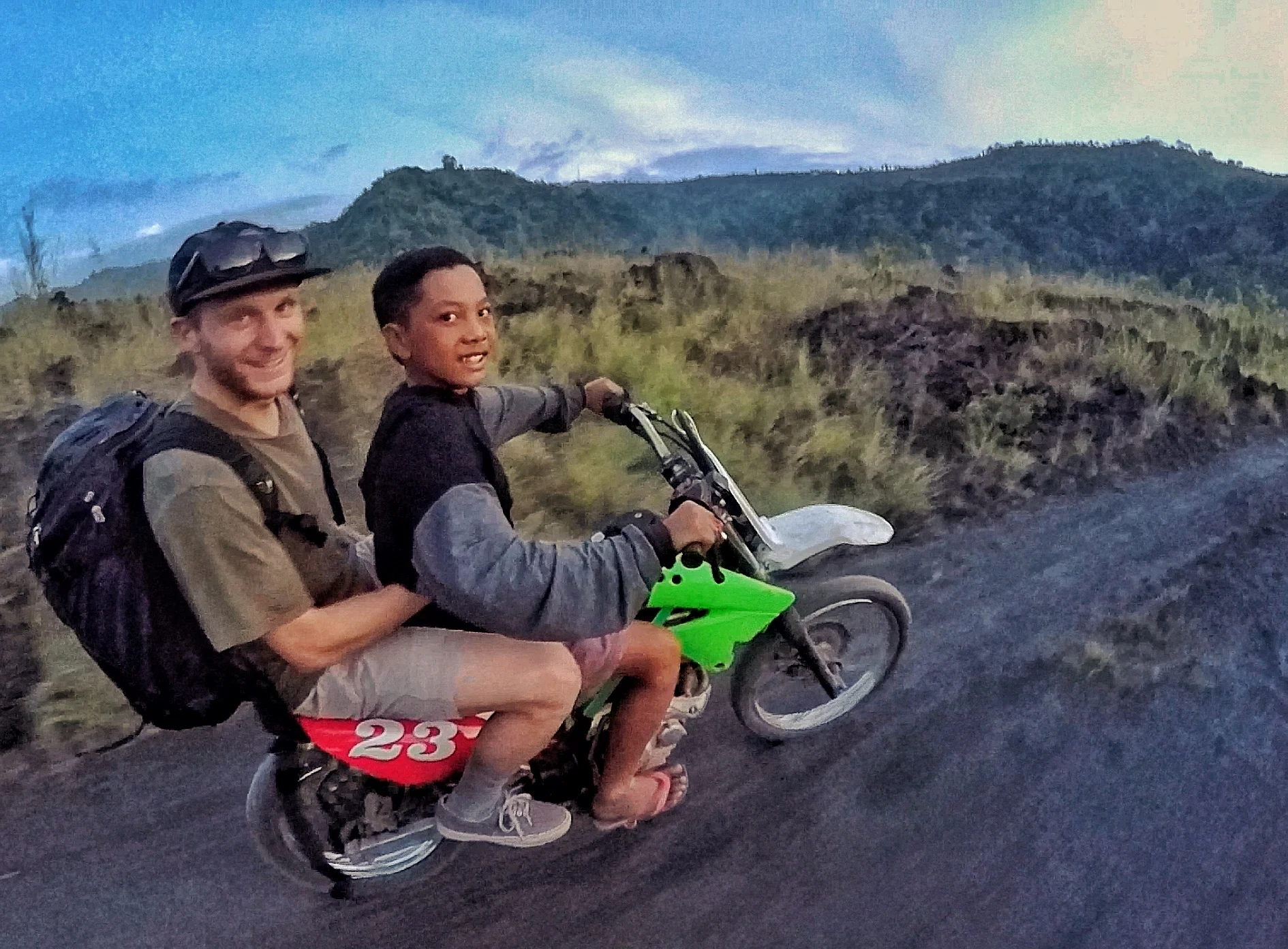 The hike out of the black sands was about 15 minutes on foot. Our camera guys had no transportation, so our curious friends insisted they hop onto the back of their motos. The boy pictured here is 10 years old, and dreams of becoming a pro motocross racer.