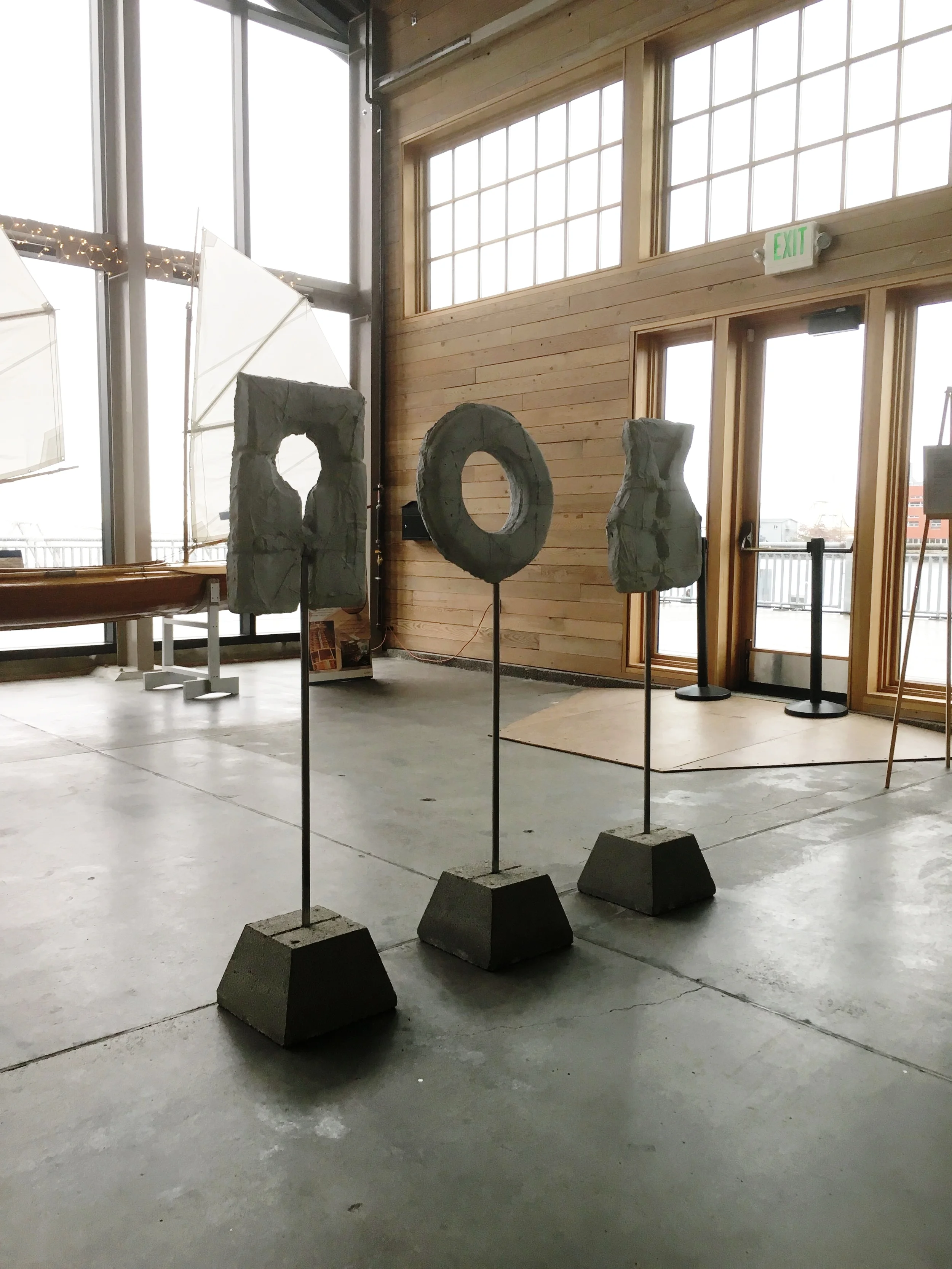 SOS Concrete / Steel, 48"h x 18"w x 12" d. Based on the Shipwrecked theme and the pre and post election of 2016, this piece "S.O.S." represents the feeling of helplessness and despair of those results in the moment. A new feeling has replaced that sentiment, that being of fierce resistance, rage, and action.