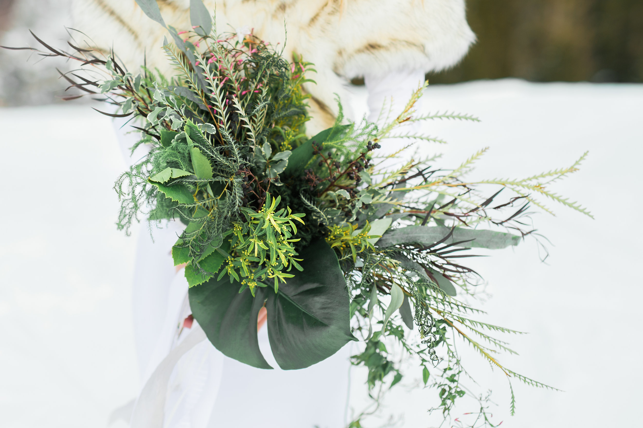 Green bridal bouquet Parie designs green wedding, green bouquet featuring Grevillea, Jasmine, seeded Eucalyptus, Elkhorn Moss, Assorted Chilean Ferns