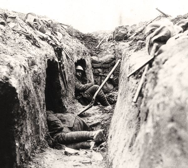 Note the 'funk-holes' dug into the front wall of the trench as a refuge from shell fire.