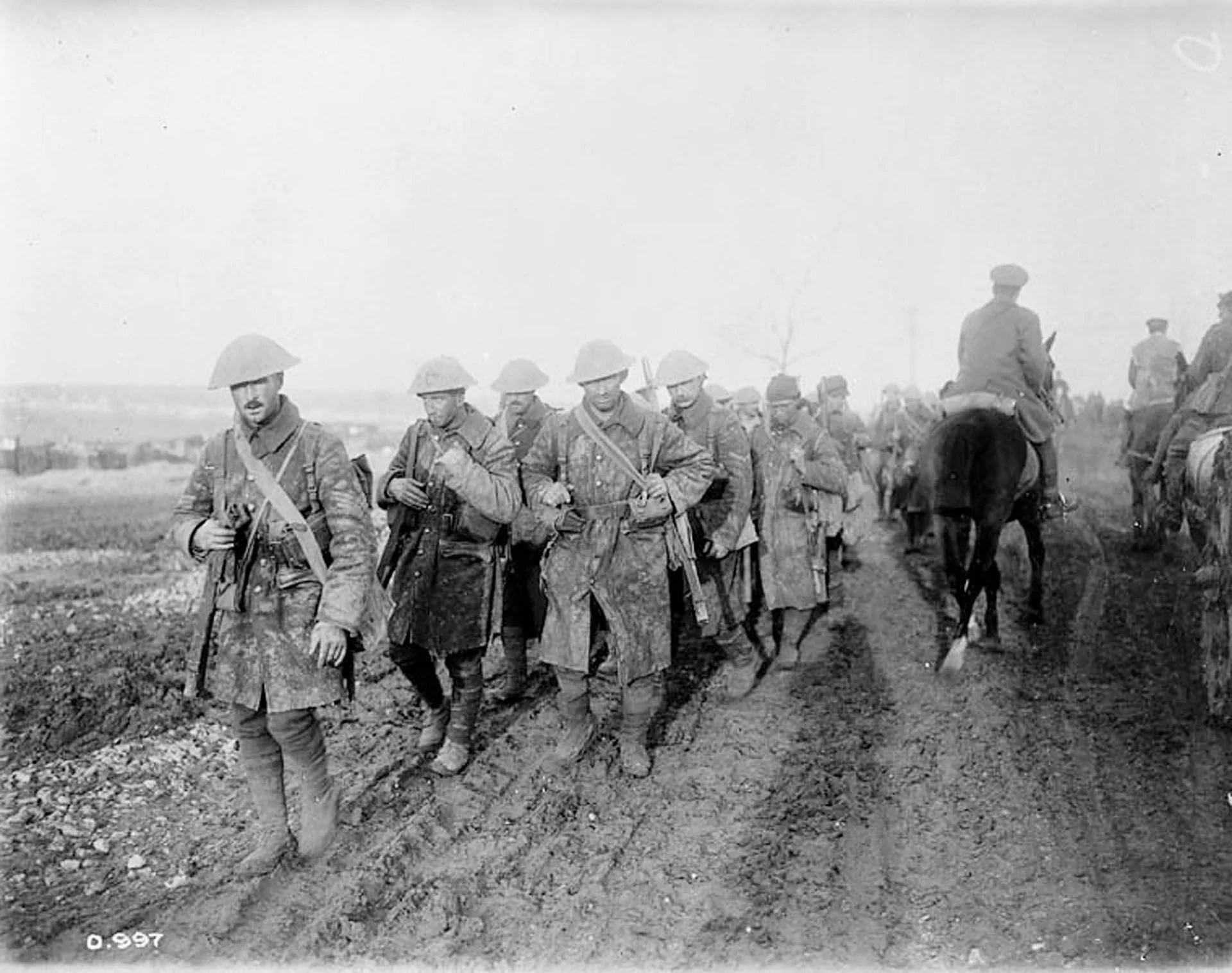 Canadians marching on the Somme. This dates from the autumn following Nicholls' injury but still gives a good impression of marching conditions during his service.