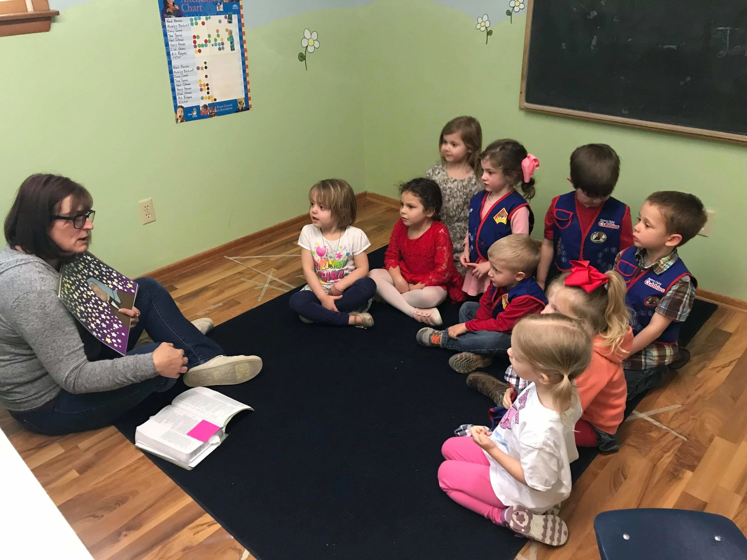 Cubbies learning their Bible verse with Shellie.