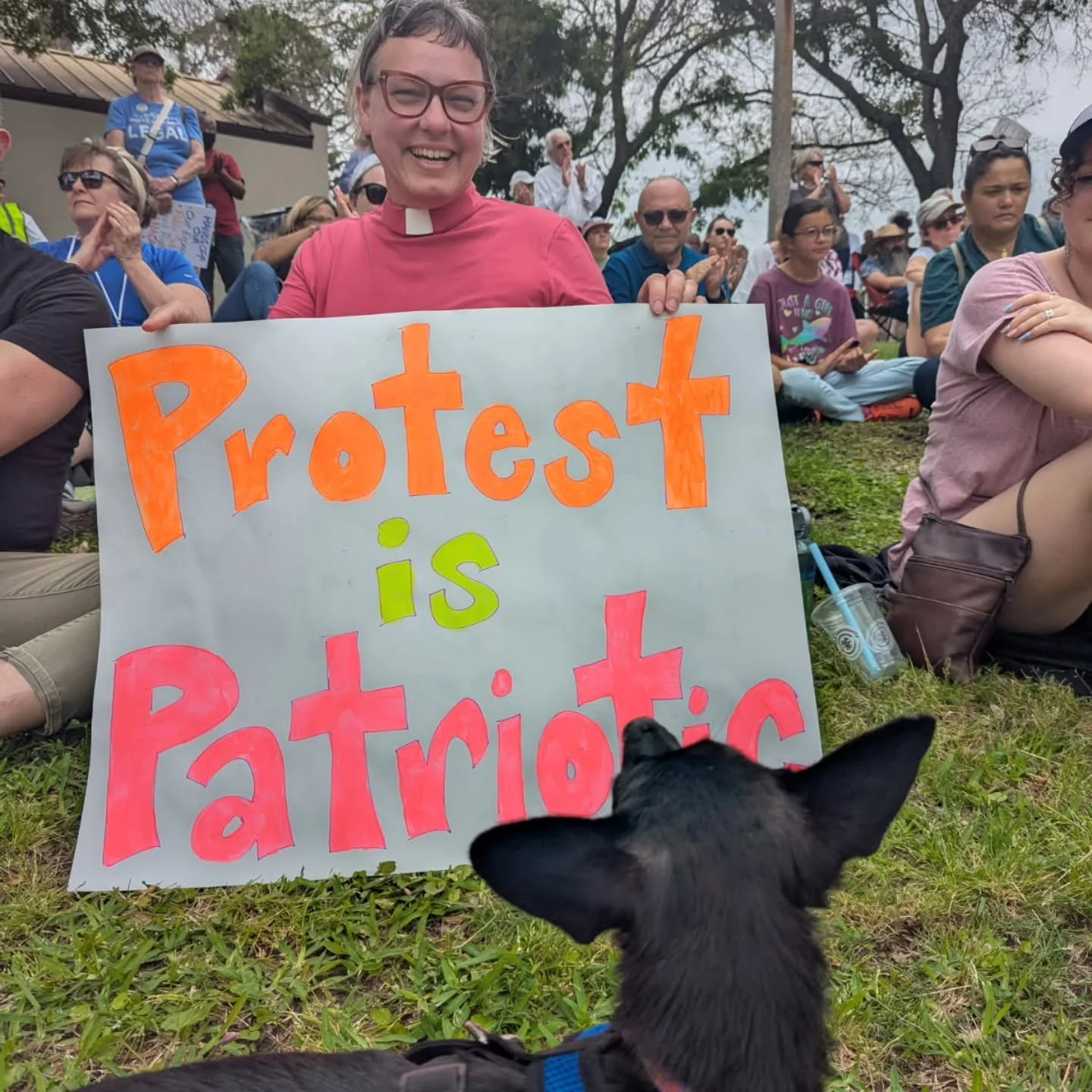 My friend and clergy colleague Rabbi Sabine snapped this pic of me at the March for Democracy in Waco. That's her cute pup checking out my sign! 

This is the exact same slogan my family put on a sign when we protested Trump putting kids in cages. Th