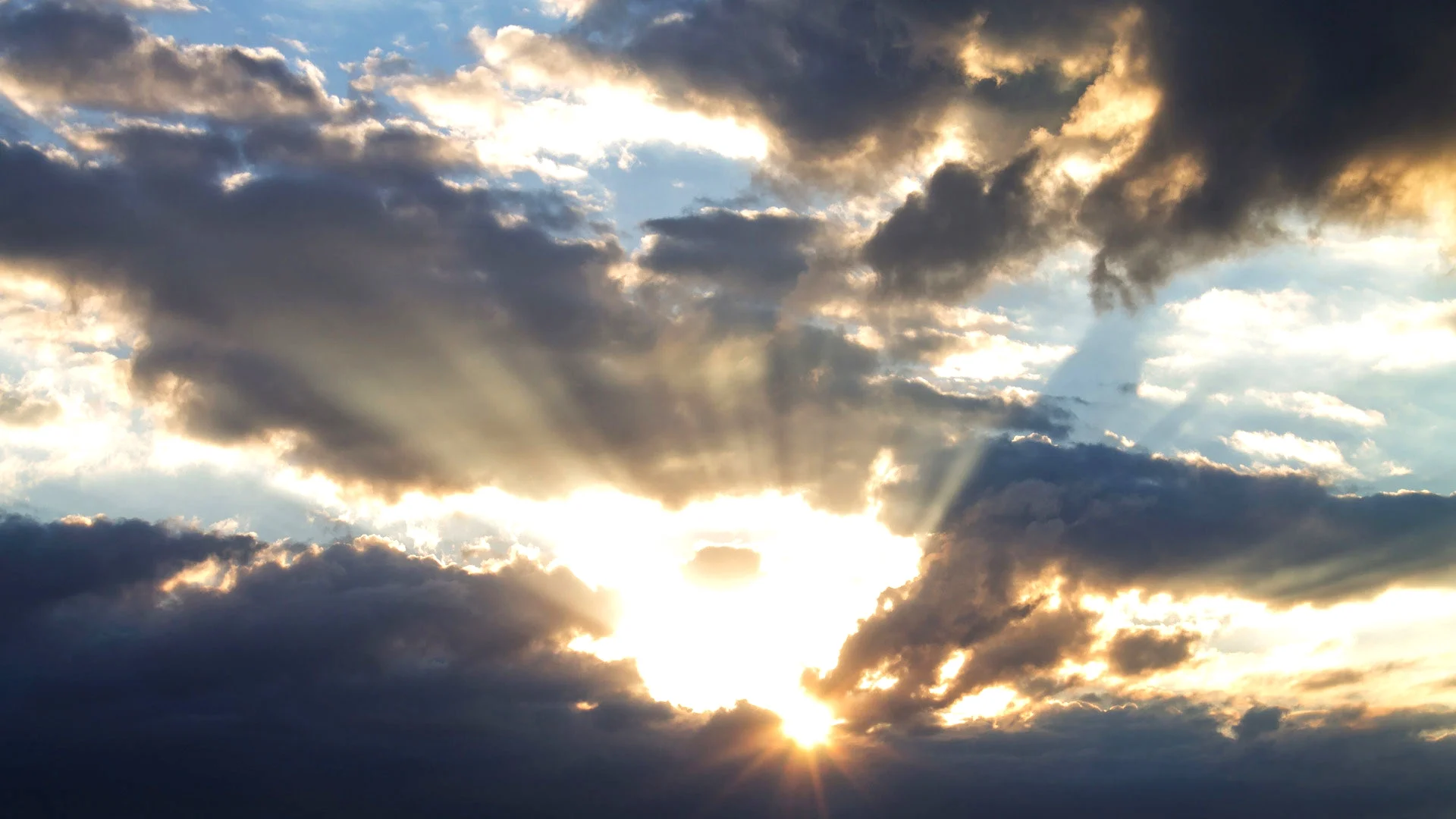 sun-shining-through-the-clouds-1920x1080-nature-background-20-2119195571.jpg
