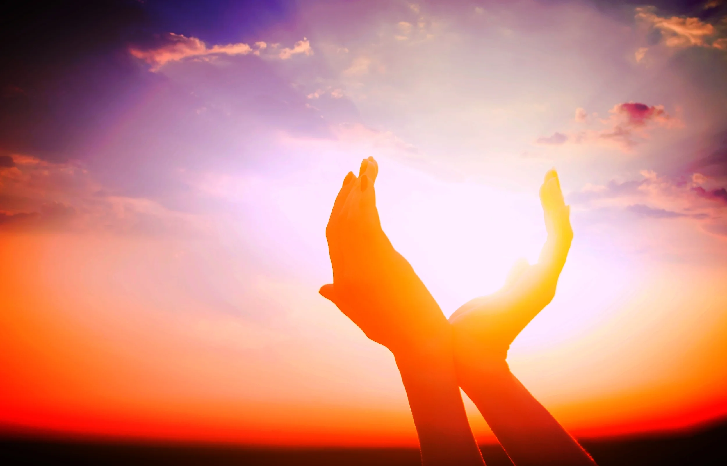 hands-held-up-to-sun.jpg