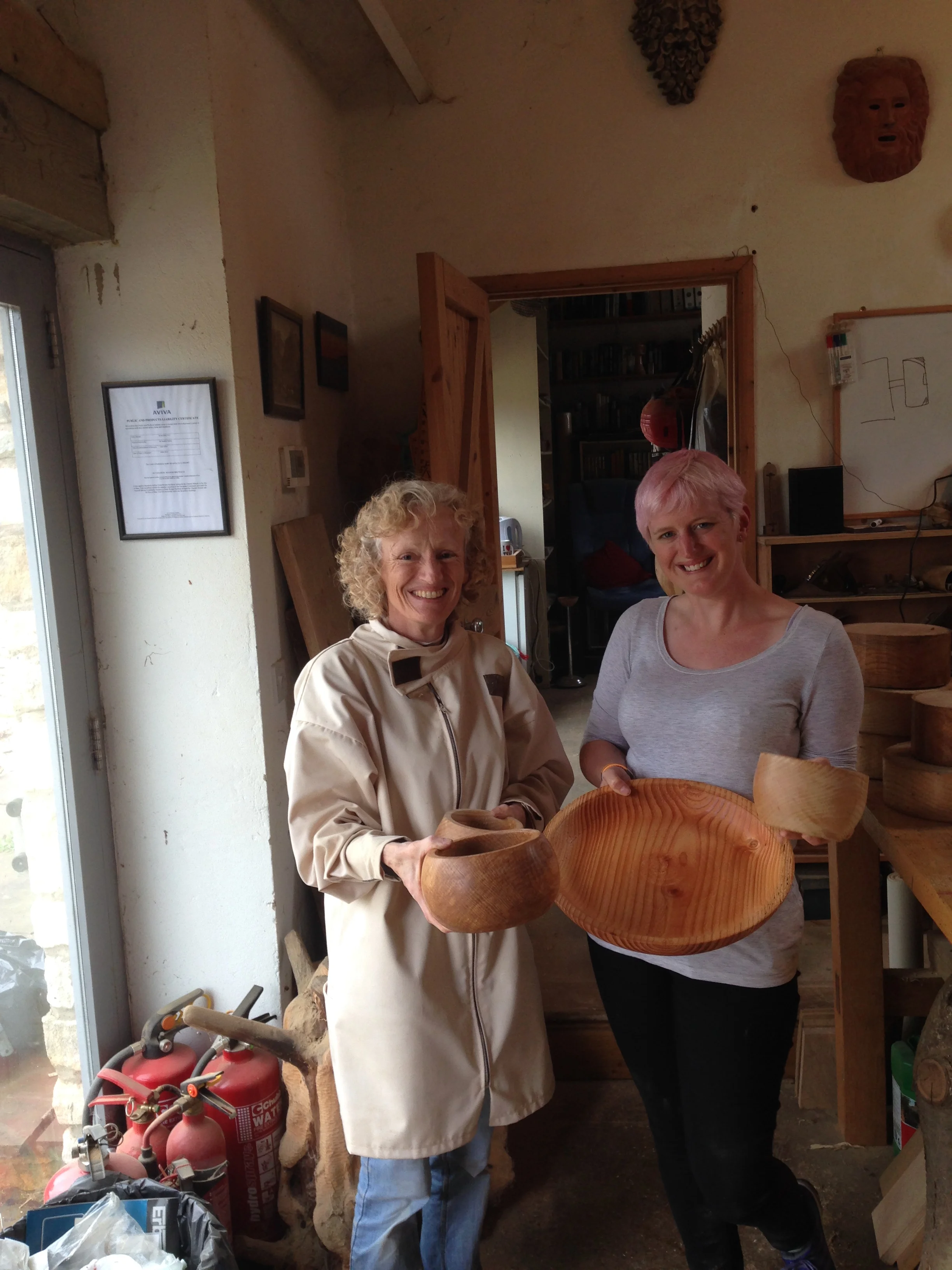 Mother & daughter at the end of a busy day wood turning for the first time.