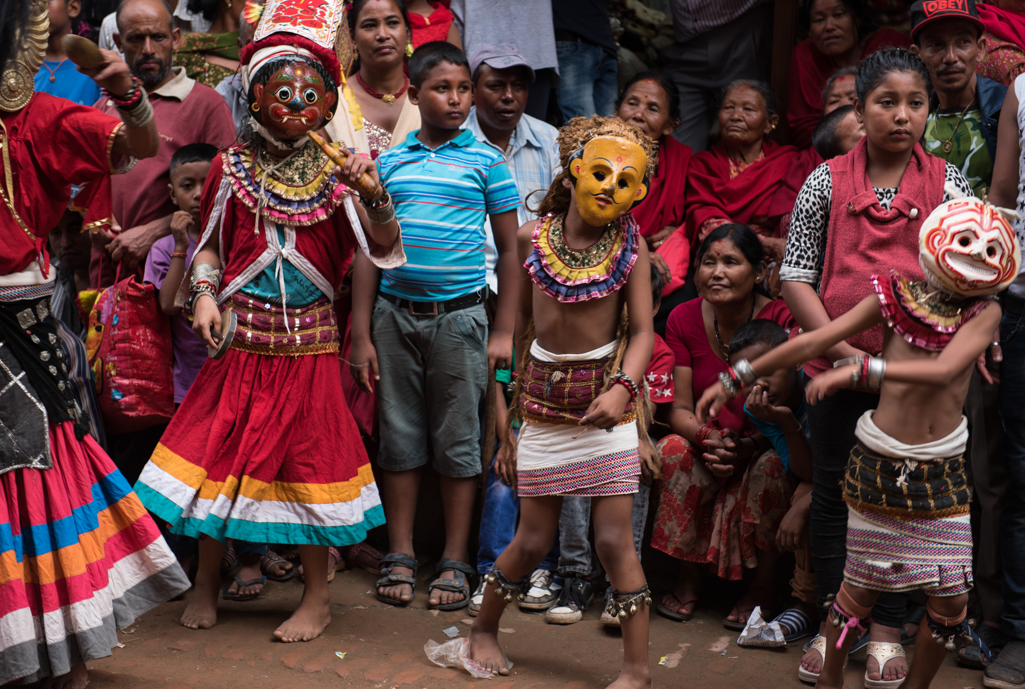 Street dancers celebrate the lives of those who passed away recently during the Gai Jatra "Cow" Festival in Bhaktapur, Nepal on Aug. 18, 2016. (Photo by Brittany Wait)