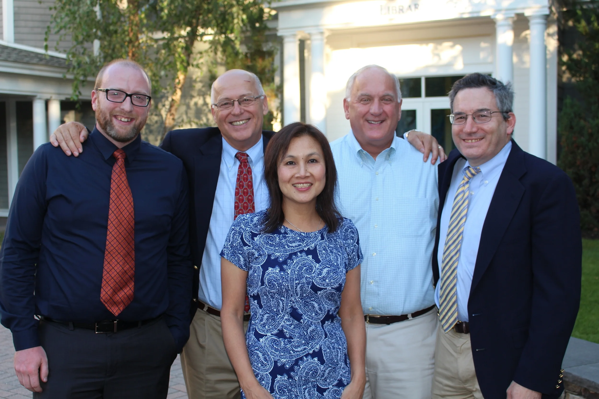 Jonathan Schmid, Meadowbrook's Director of Innovation and Technology; Headmaster Steve Hinds; Ami Danoff; Meadowbrook Board of Trustees President Tom Grape; Will Danoff -- in front of where the new Academic Commons and the Danoff Family Innovation Center will be located.