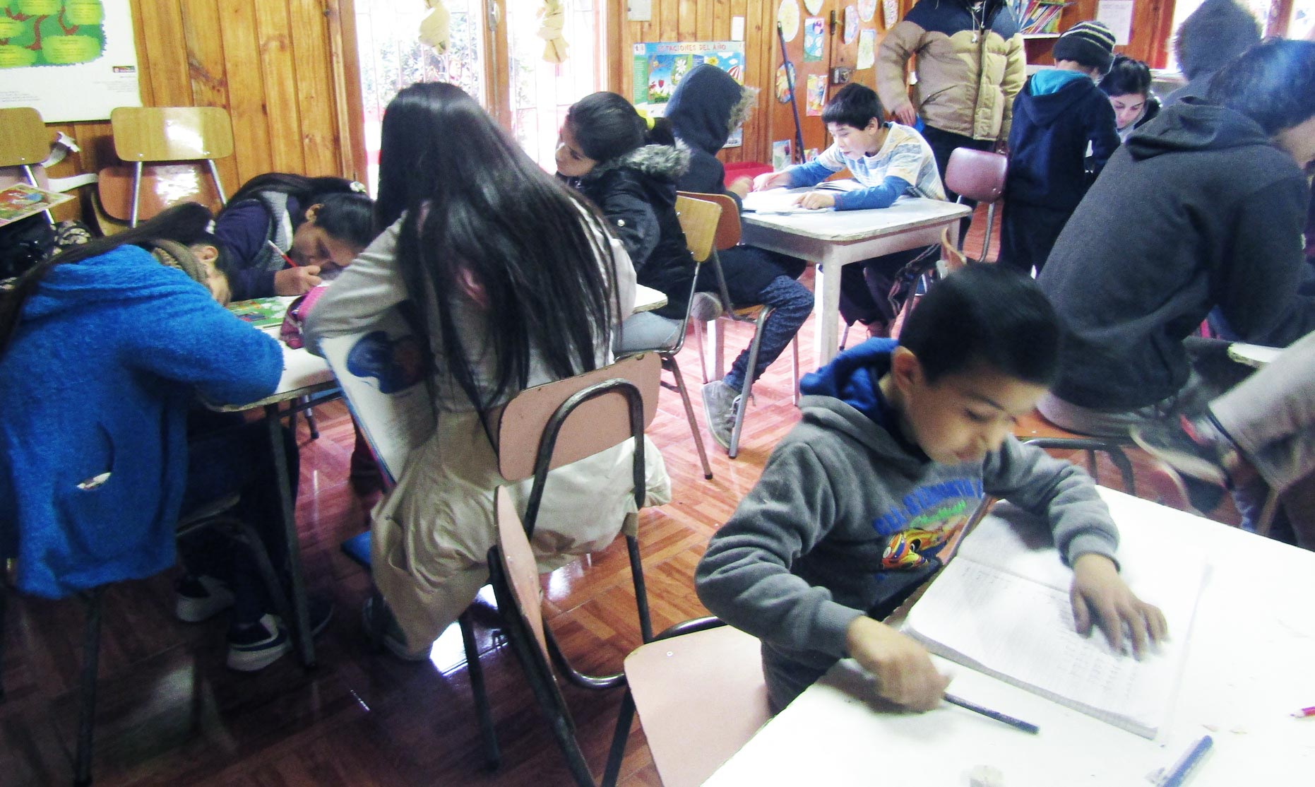 A busy day in the classroom at Centro Abierto Santa Adriana