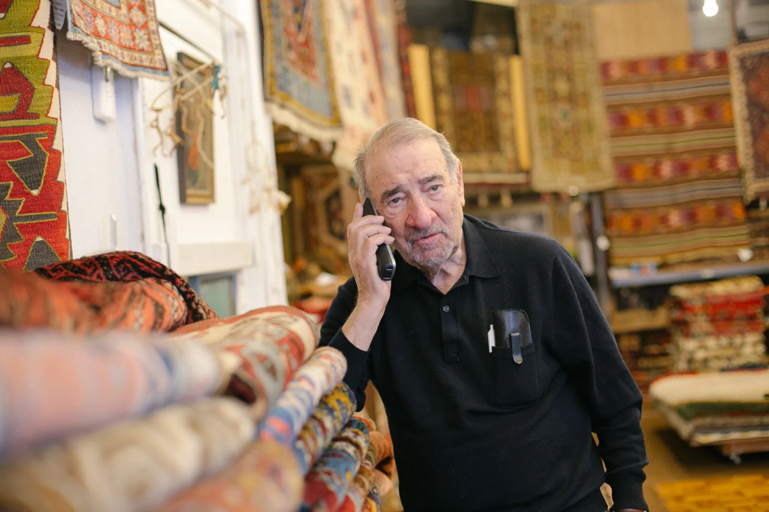 "Age is bad for the man and woman but very good for the rug," Ed said while talking about vintage rugs that line his shop in the Lakeview area. 7/24