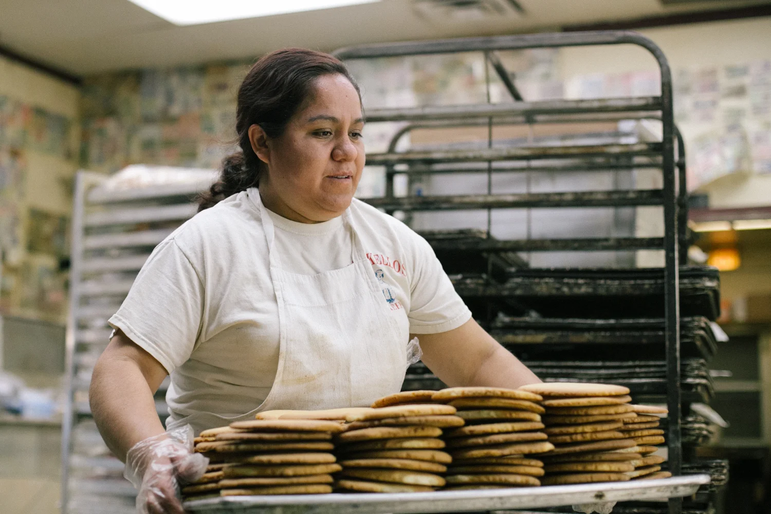 Rosa loads hundred of fresh baked cookies into a display case in the wee hours of Monday morning. I'll let you know how the croissant are in a few hours. 18/24