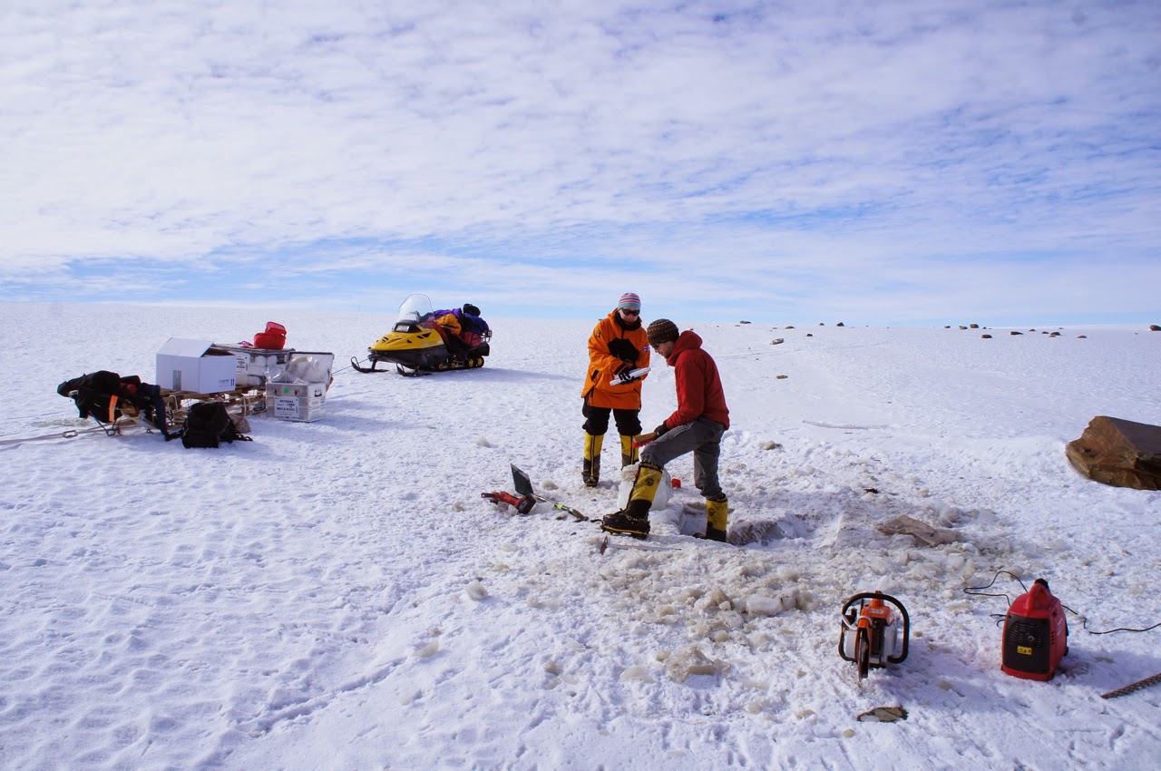 Collecting ice samples from debris bands on the blue ice