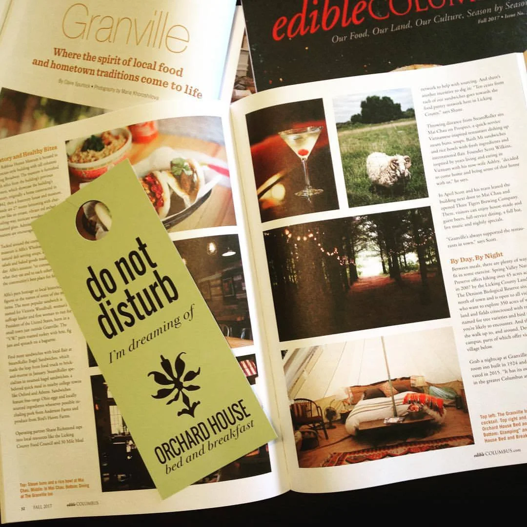 Edible Columbus – Fall 2017 By Claire Spurlock Every time I visit Granville I find new depths to its charm. The village’s cohesive and independent food community beckons, as do the boutique shops and the abundant strolls through blocks of well-loved homes and mature trees bordering downtown. Granville is easily accessible from Columbus and, once there, largely walkable in fair weather. Wherever you look, glimpses of Granville’s history are evident in buildings that remain from its inception and carefully plotted streets built to mimic the New England hometowns of early settlers. Modern Granville residents have helped solidify community traditions and charm and usher in a modern spirit that allows for business and tourism to thrive… Settle in at the Orchard House Bed and Breakfast, where guests can visit with resident chickens, goats and sheep on the 12-acre property and relax in a restored 1850s farmhouse complete with spacious guest rooms named for prior residents. Orchard House offers seasonal “glamping” through October and hosts weddings in the pine grove. Breakfast is served each morning in a sunny nook by innkeeper Dean Lowry, featuring eggs collected daily from the chicken coop, local meats and produce, Lucky Cat bread and One Line coffee. After enjoying a leisurely cup, it’s time to hit the streets for a second round of Granville explorations. “There’s a lot to draw from within community. Certainly, as far as support and resources, but then also ingredients, manpower and love,” says Alfie’s owner Sam.
