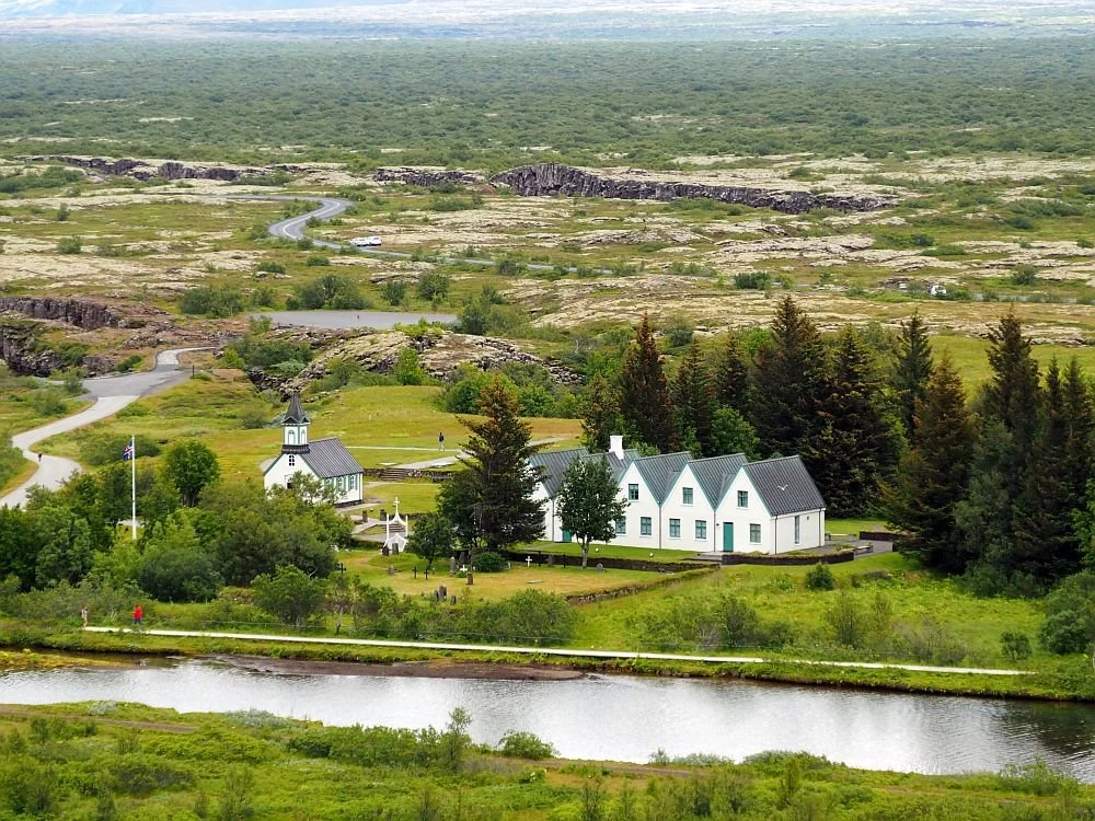 Thingvellir, Icelandic world heritage site, home of the althing, Icelandic parliament, the mid-atlantic rift ridge, a church, and waterfall.