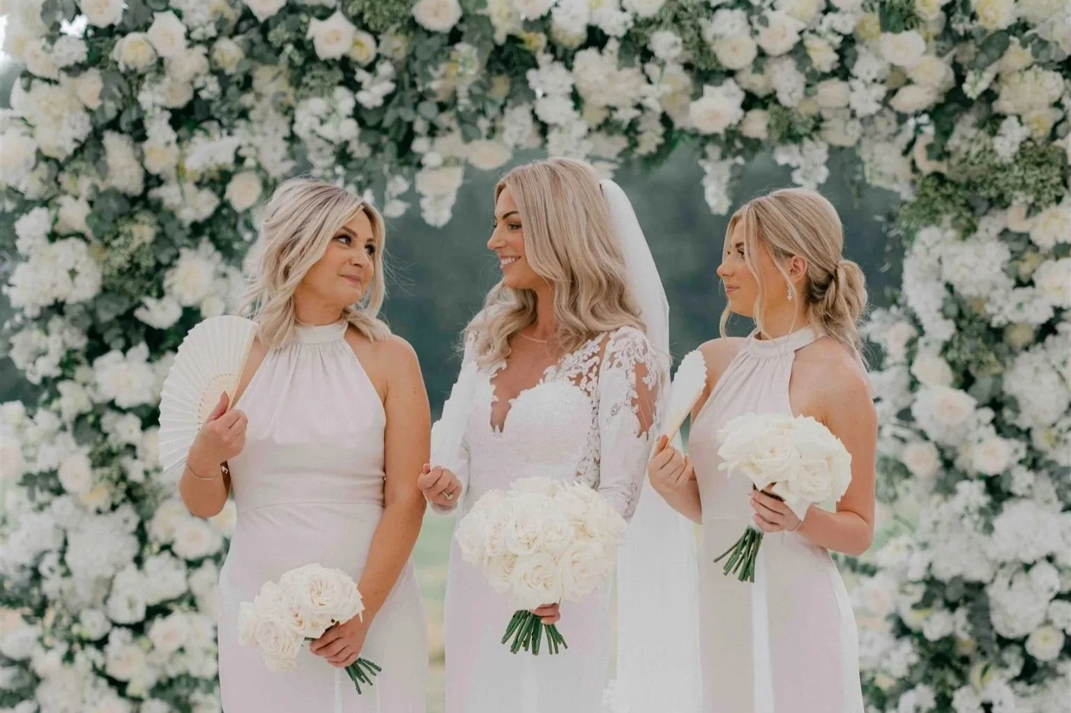 White flower arch for marquee wedding