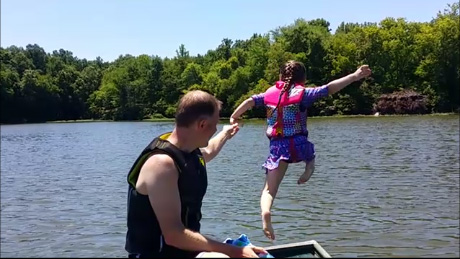   Avery jumping in the lake to practice her preparedness skills.&nbsp;Photo by Debra McGhan.  