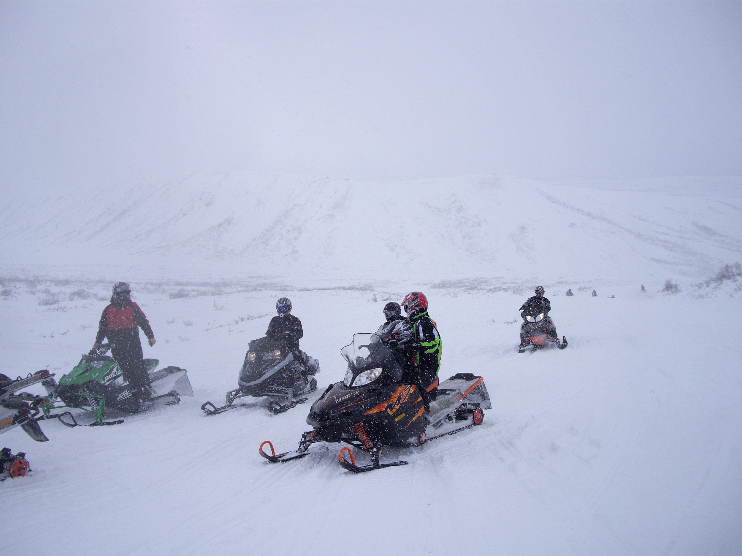   A group of riders stop to discuss conditions. Photo by Debra McGhan  
