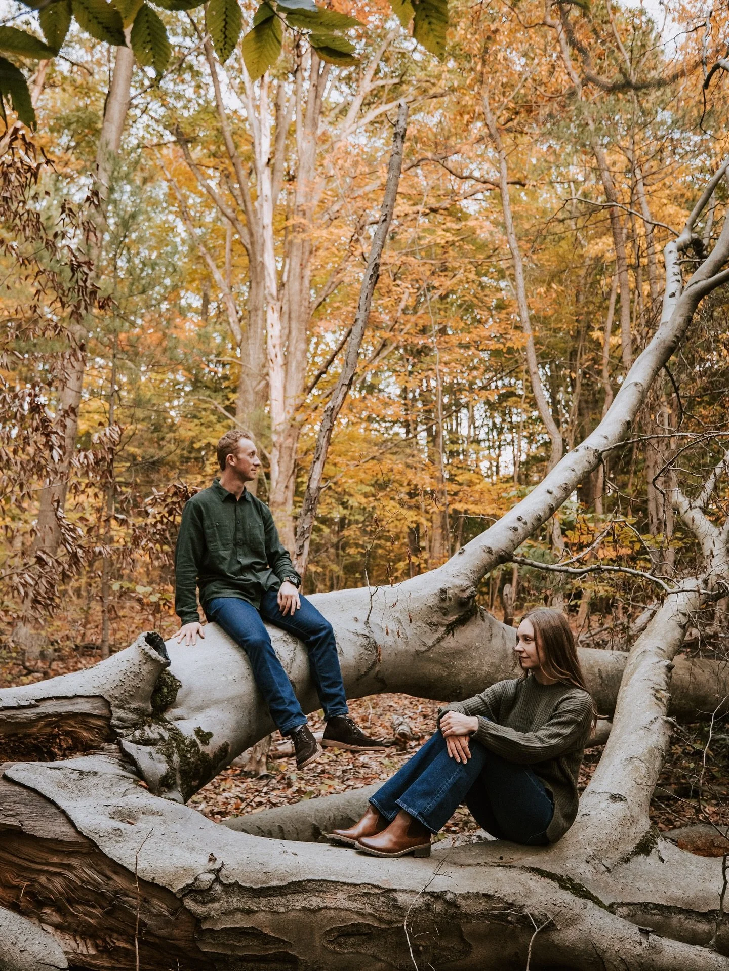 Jessica &amp; Andrew in West Michigan, mid-Fall; this state and its beauty get me every single time. ❤️🧡💛
We wandered through the woods, chased the best colors, and talked about everything under the sun.
This is the place where Andrew proposed - so