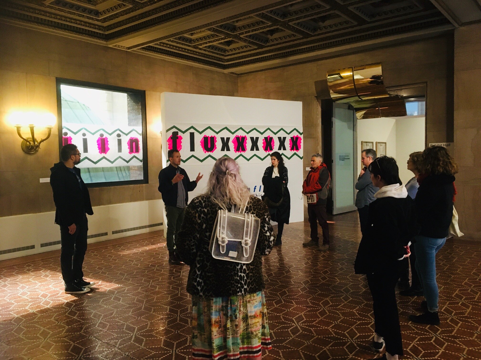  Alberto Aguilar and Rodrigo Lara Zendejas leading a tour of  In Flux: Chicago Artists and Immigration  at Chicago Cultural Center in early March 2020. 