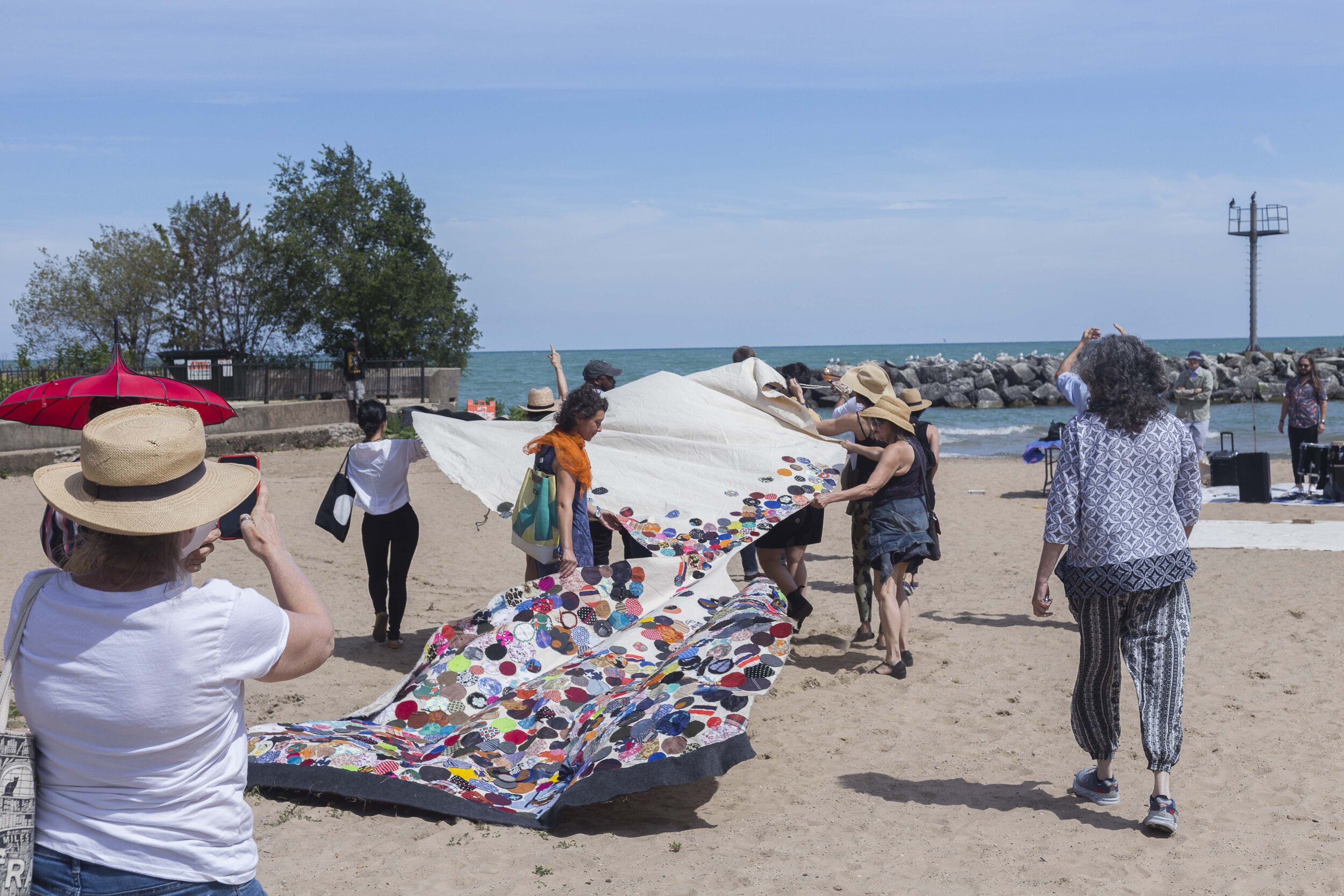  Diane Christiansen and artists in procession for  Water Music on the Beach  2019. 