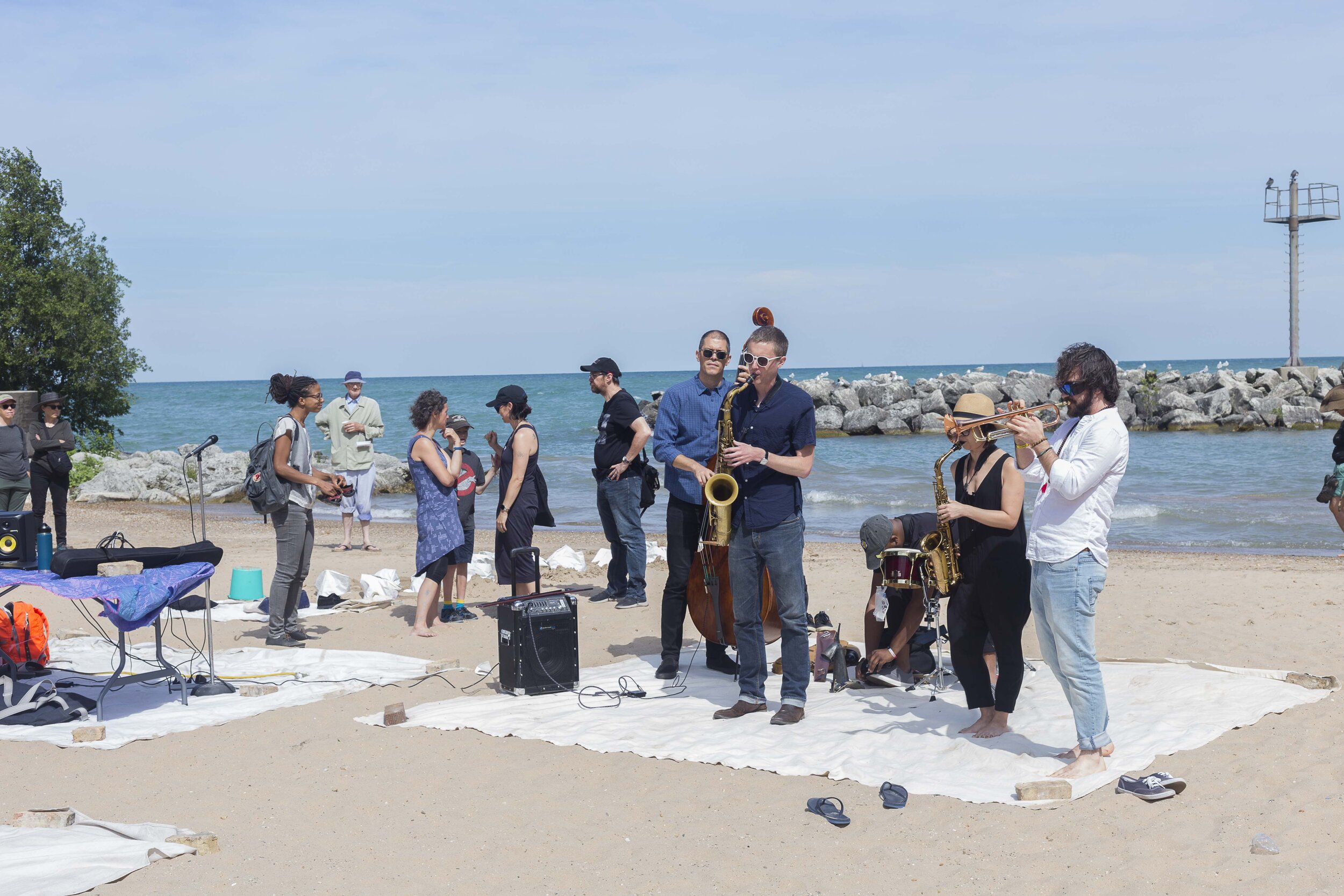  Alexander Massa performs with Arthur Black, Anton Hatwich, Emerson Hunton, Quin Kirchner, Isaiah Spencer, and Mai Sugimoto for  Water Music on the Beach  2019. 