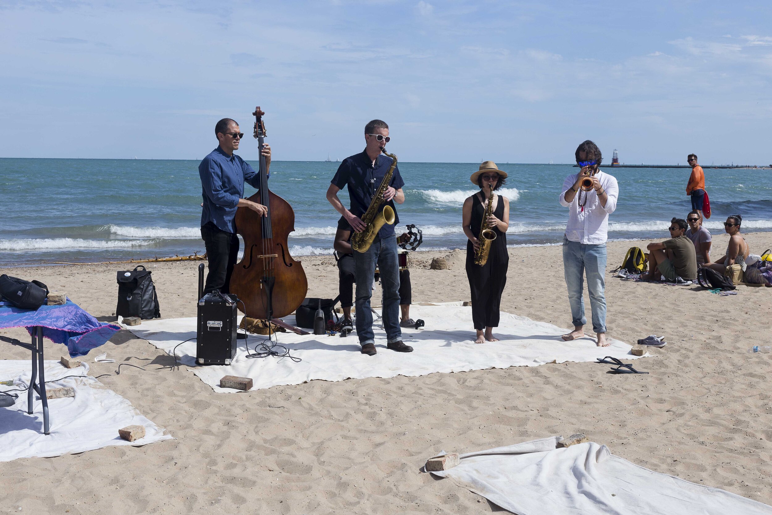  Alexander Massa performs with Arthur Black, Anton Hatwich, Emerson Hunton, Quin Kirchner, Isaiah Spencer, and Mai Sugimoto for  Water Music on the Beach  2019. 