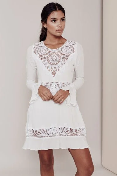 For Love & Lemons Valentina Mini Dress , $297, available at For Love & Lemons .