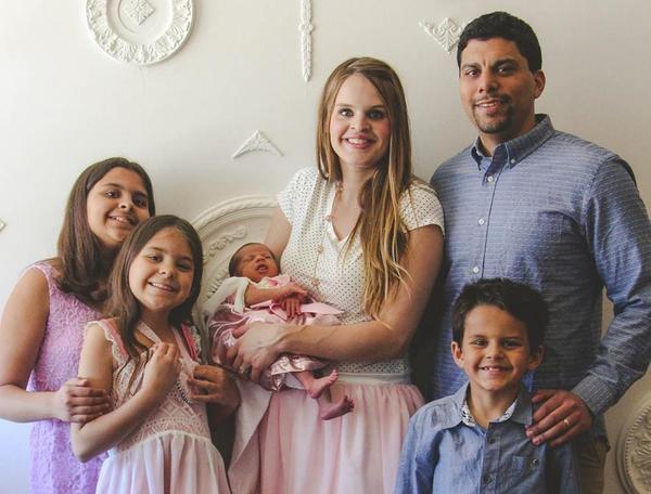 Aubrey with her three daughters, son and husband.