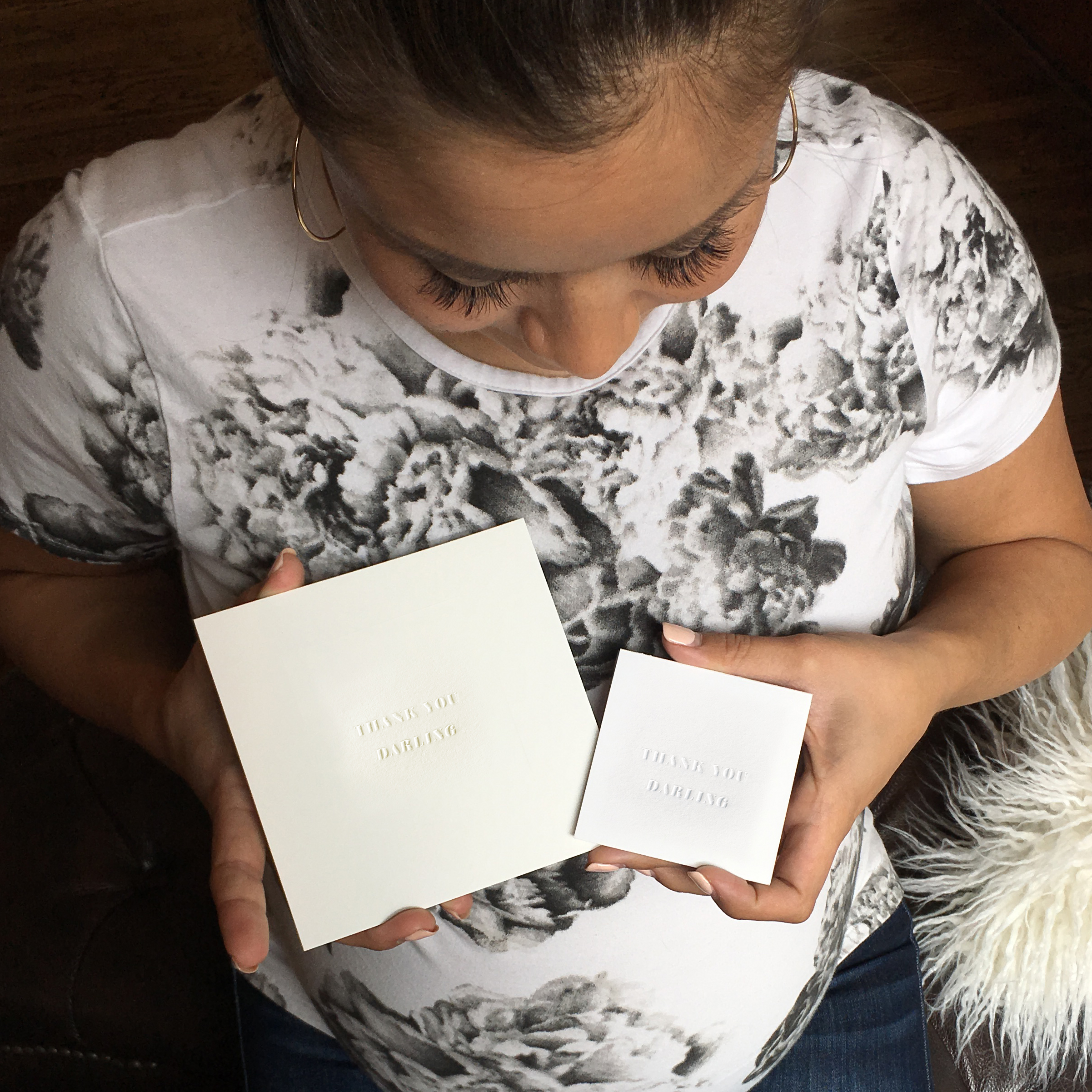 Catherine Lowe holding both sizes of our THANK YOU DARLING cards.