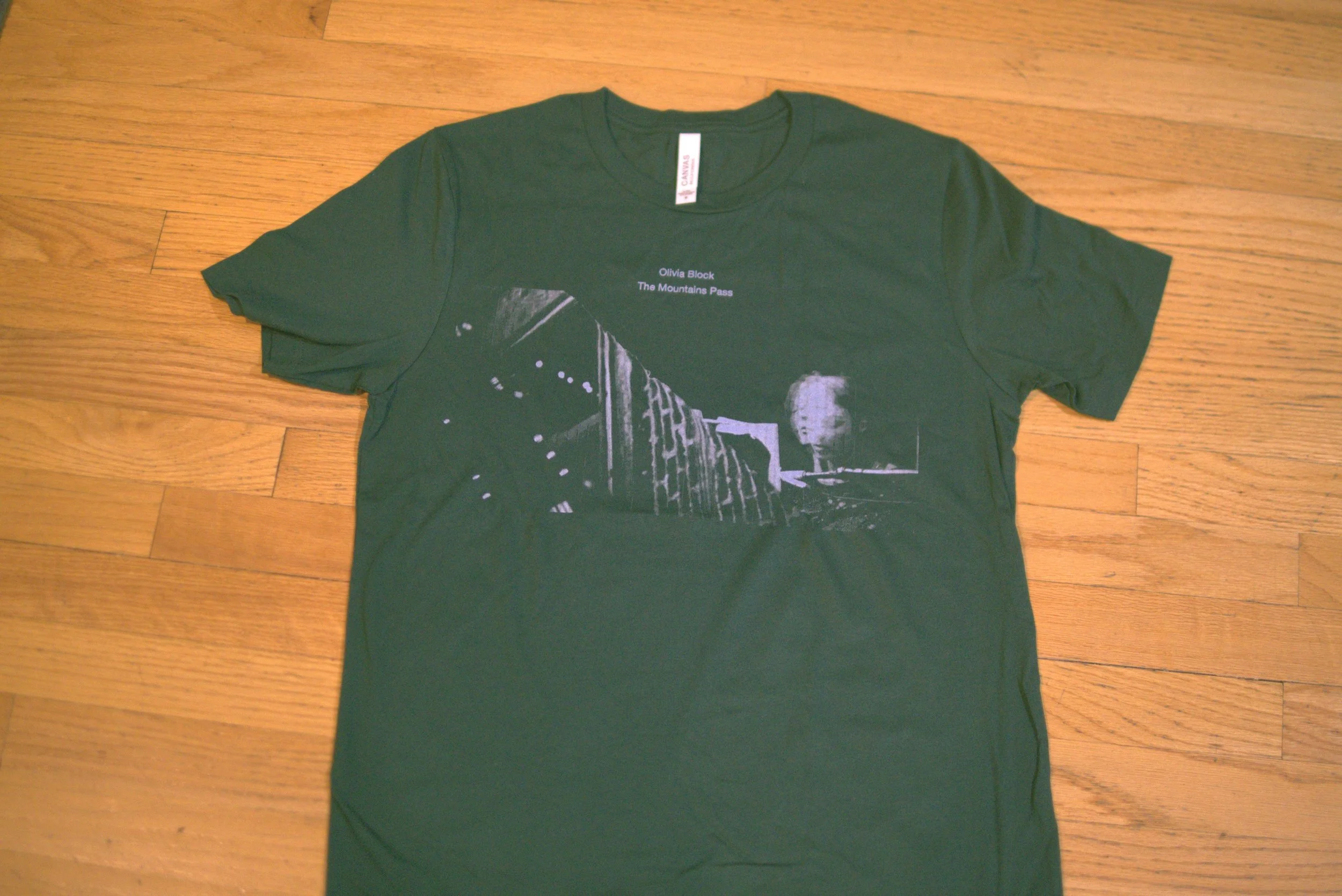 Mountains Pass T-shirt on the floor.jpg
