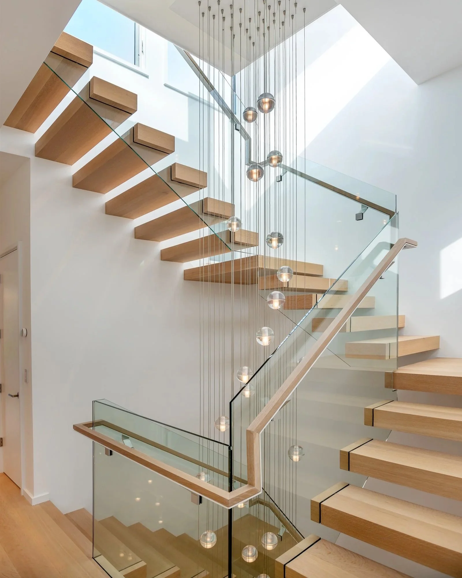 glass and wood stairwell made hive builds san francisco general residential contractor